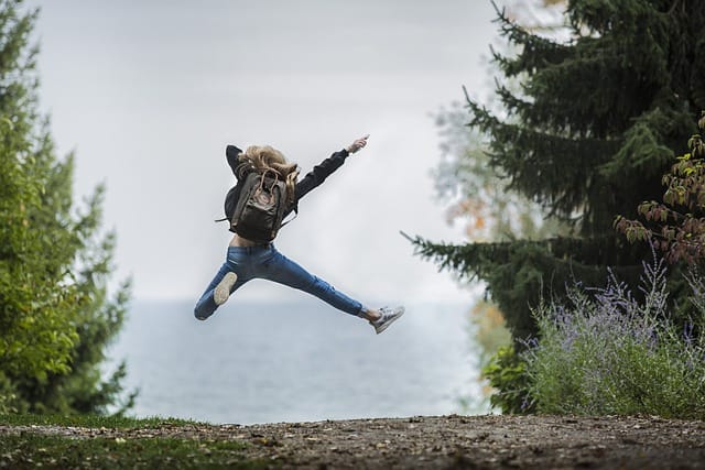 woman jumping, happy